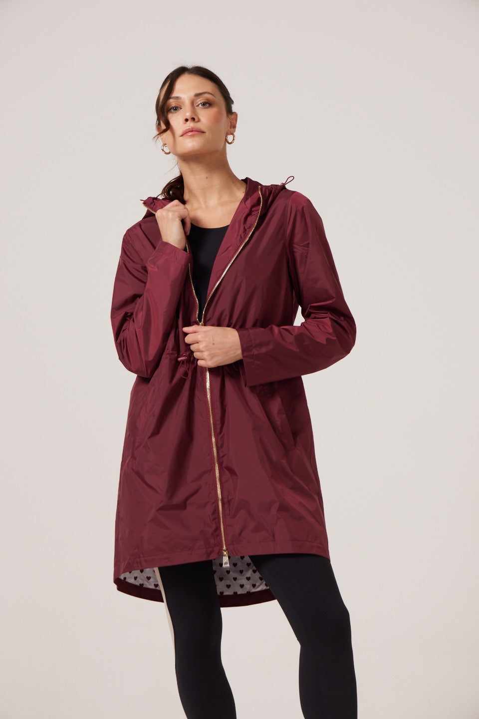 Maroon Raincoat with a heart lining